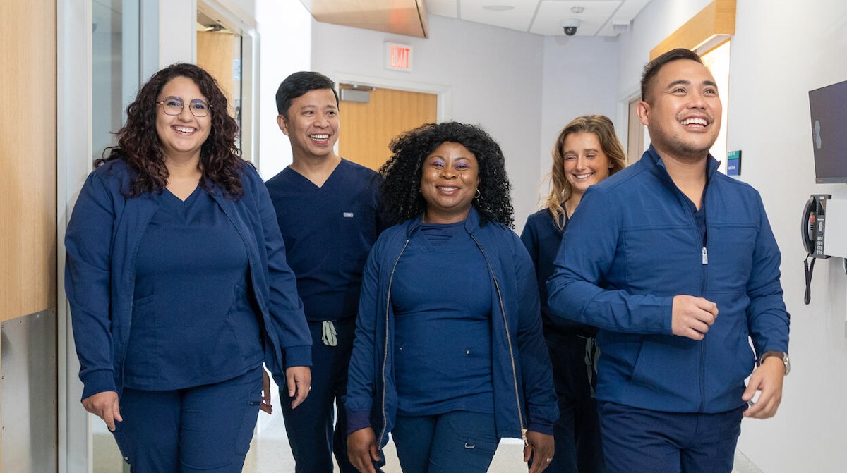 Group of nurses walking in hallway